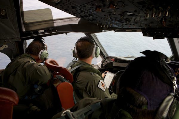 Australia, China at odds over search for missing Malaysian plane