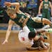 (left to right) Rushford-Peterson's Cole Kingsley, Maranatha Christian's Damario Armstrong and other players crashed to the ground chasing a loose bal