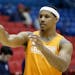 Tennessee forward Jarnell Stokes passes the ball during practice for an NCAA college basketball tournament game, Tuesday, March 18, 2014, in Dayton, O