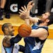 Memphis James Johnson, left, and Wolves Kevin Love battled for control of a rebound. Both were given technical fouls on the exchange. ] MINNESOTA TIMB