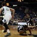 Wolves Kevin Love gain control of a loose ball and prepared to pass it to an open Corey Brewer down court in the first half. ] (KYNDELL HARKNESS/STAR 