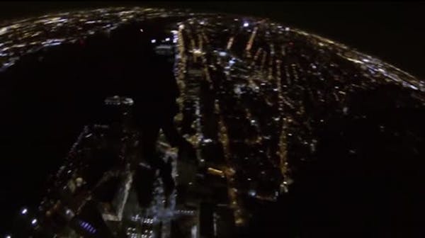 Base jumpers leap off of One World Trade Center