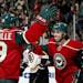 Bruins defenseman Zdeno Chara could only watch as the Wild’s Jason Pominville and Matt Moulson (26) celebrated Pominville’s second goal.
