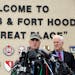 Lt. Gen. Mark Milley, left,and U.S. Sen. John Cornyn, right, talk to the media near Fort Hood's main gate, Thursday, April 3, 2014, in Fort Hood, Texa