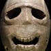 In this Monday, March 10, 2014 photo, a 9,000 year-old mask is on display at the Israel Museum in Jerusalem. The exhibition called "Face To Face" show