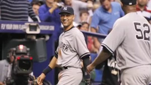 Yankees turn triple play, rout Rays
