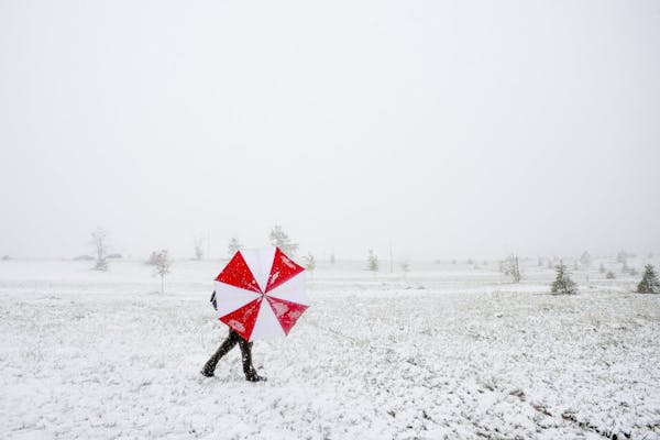 Snow falls in Rockies; twisters hit Plains