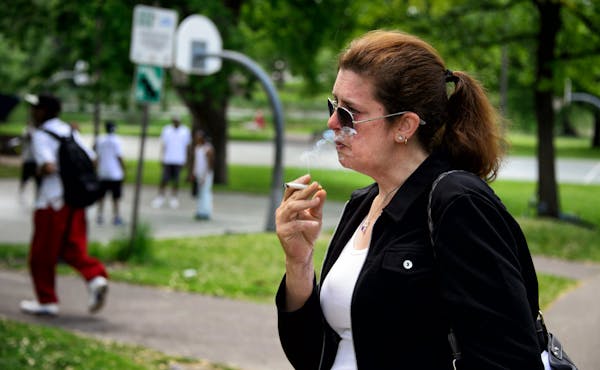 Tracie Roberts smoked recently at Loring Park in Minneapolis.