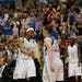Maya Moore celebrated with Lindsay Whalen after she drew the foul from San Antonio's Heather Butler during the second half.