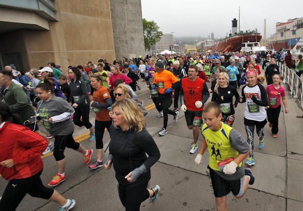 Over 2,000 runners competed in the William A. Irvin 5K race in downtown Duluth. ] Friday's festivites leading up to Saturday's Grandmas Marathon.