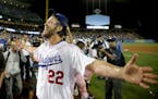 Los Angeles Dodgers starting pitcher Clayton Kershaw celebrates his no-hitter against the Colorado Rockies after a baseball game in Los Angeles, Wedne