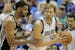 San Antonio Spurs forward Tim Duncan, left, guards Dallas Mavericks forward Dirk Nowitzki (41) in the first half of Game 6 of an NBA Western Conferenc