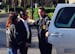 In this photo provided by ESPN, Anthony Bosch, center, is escorted by Drug Enforcement Administration officials in Weston, Fla., on Tuesday. The owner