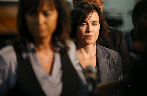 Minneapolis Mayor Betsy Hodges, shown in July, listened as Minneapolis Police Chief Janee Harteau finished addressing reporters.