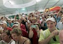 A crowd gathered to grab a glance or photo of golf great Jack Nicklaus in the exhibition tent during the second round of the 3M Championships, Saturda