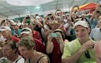 A crowd gathered to grab a glance or photo of golf great Jack Nicklaus in the exhibition tent during the second round of the 3M Championships, Saturda