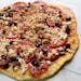 Pizza on the grill: Medium heat, maximum pie. Grilled Tomato, Feta and Olive Pizza. Illustrates BBQ (category d), by Jim Shahin, special to The Washin