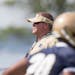 Notre Dame head coach Brian Kelly looks on during the first training camp practice on Monday, Aug. 4, 2014, at Culver Academies in Culver, Ind. (AP Ph