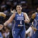 Minnesota Lynx's Janel McCarville (4) celebrates with teammates Maya Moore (23) and Tan White (5) during the second half in Game 2 of a WNBA basketbal