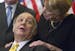 FILE - This March 30, 2011 file photo shows former White House press secretary James Brady, left, who was left paralyzed in the Reagan assassination a