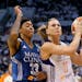 Phoenix Mercury's Penny Taylor, drives past Minnesota's Seimone Augustus during the second half in Game 1 of the WNBA basketball Western Conference fi