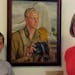 Caralee Bjerkness and grandson Austin Neyens saw Roy Schellin’s portrait for the first time at the Pentagon.