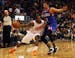 Phoenix Suns point guard Eric Bledsoe (2) shields Philadelphia 76ers point guard Michael Carter-Williams (1) from the ball in the third quarter during