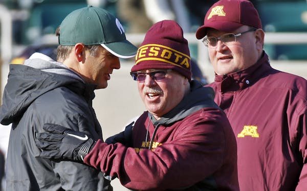 Gophers coach Jerry Kill, center, has gotten beyond a season of health issues to become a strong authoritative figure.