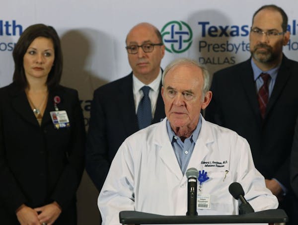Dr. Edward Goodman, an infectious disease specialist, speaks at a press conference to answer questions about the confirmed Ebola case at Texas Health 