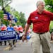 Sixth District candidate Tom Emmer, marching in the Granite City Days parade in St. Cloud in June, isn’t a conservative firebrand this time around.