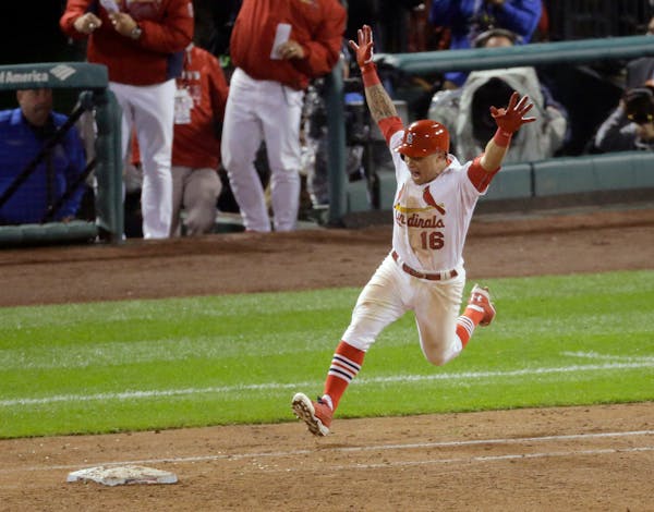 Cardinals even playoff on Wong's 9th-inning homer