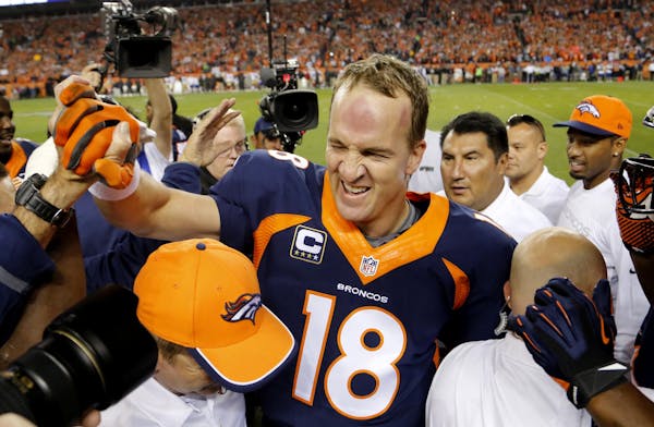 Manning sets career touchdown pass record
