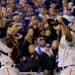 San Francisco Giants' Madison Bumgarner, right, and catcher Buster Posey celebrate after Game 7 of baseball's World Series against the Kansas City Roy