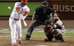 St. Louis Cardinals' Oscar Taveras hits a home run during the seventh inning in Game 2 of the National League baseball championship series against the