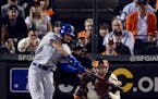 The Kansas City Royals' Eric Hosmer connects for an RBI single in the sixth inning against the San Francisco Giants in Game 3 of the World Series at A