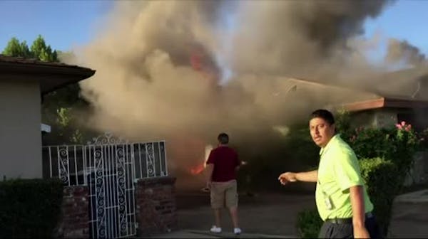 Man carries Fresno man from burning home