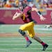Gophers' quarterback Mitch Leidner (7) rushed for 17 yards in the second quarter as the Minnesota Gophers took on the Purdue Boilermakers, Saturday, O