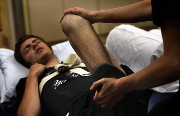 Physical therapist Charlotte Brenteson worked with Josh during a therapy session.