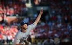Los Angeles Dodgers' Clayton Kershaw pitches against the St. Louis Cardinals during the first inning of Game 4 of the National League Division Series 