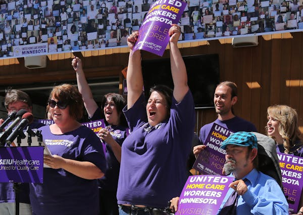 Many home care workers in the state, including Sumer Spika (at lectern) welcomed the voting victory and the right to unionize.