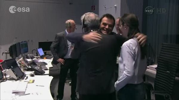 Crew cheers as European probe lands on comet