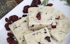Shortbread with rosemary, dried cranberries and goat cheese is a savory, slightly sweet, festive appetizer for the holidays.