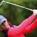 Northern Ireland's Rory McIlroy watches his tee shot during the first round of the Australian Open golf championship in Sydney, Australia Thursday, No