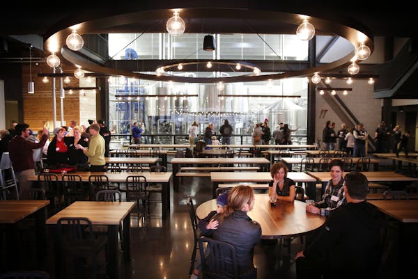 Employees and their guests gathered late last month in Surly’s 275-capacity beer hall for their first walk-through and a toast to the new brewing co
