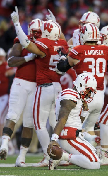 Nebraska quarterback Tommy Armstrong Jr. looked downcast after getting sacked by Wisconsin last Saturday.