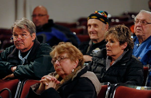 Miners, retired miners, union officials, local leaders and industry representatives gathered at the Hibbing Memorial Building to hear the final report