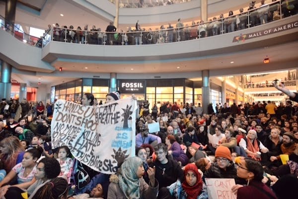 Protesters at the Mall of America on Saturday.