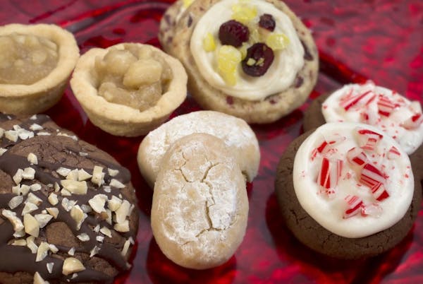 The 2014 Taste Holiday Cookie Contest winner is, center, Italian Almond Cookies -- surrounded by the four finalists, clockwise from top, Tart and Sass
