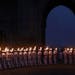 Indian navy personnel hold torches as they perform a drill during Naval Day celebrations at the Arabian Sea in Mumbai, India, Tuesday, Dec. 2, 2014. N