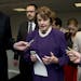 FILE - In this June 3, 2014 file photo, Senate Intelligence Chair Sen. Dianne Feinstein, D-Calif. is pursued by reporters on Capitol Hill in Washingto